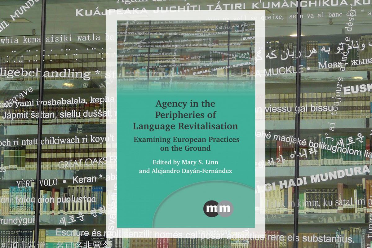 Book cover with title: Agency in the Peripheries of Language Revitalization: Examining European Practices on the Ground. A photo along the upper border of the book, and in the background, shows a window into a library decorated with phrases in many different languages.