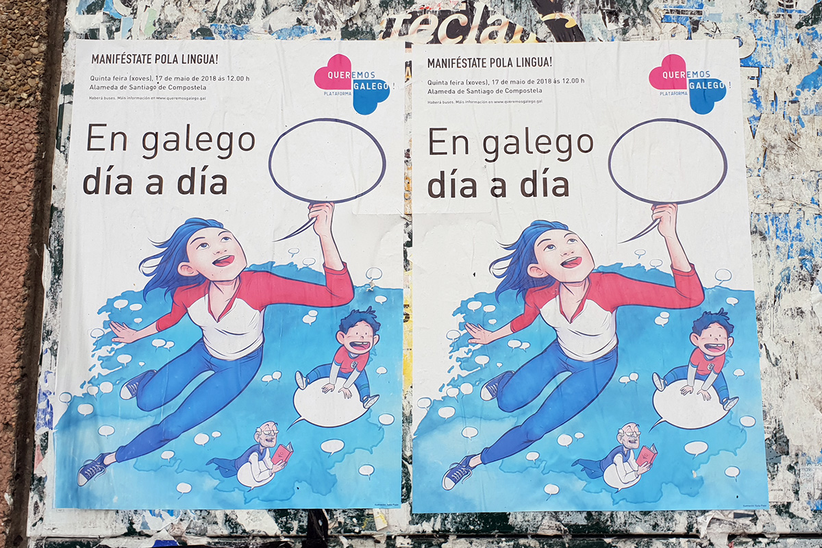 Street posters encouraging people to join the Galician language parade on May 17, 2018, organized by Queremos Galego (“We Want Galician”). The main text reads, “In Galician day by day.”