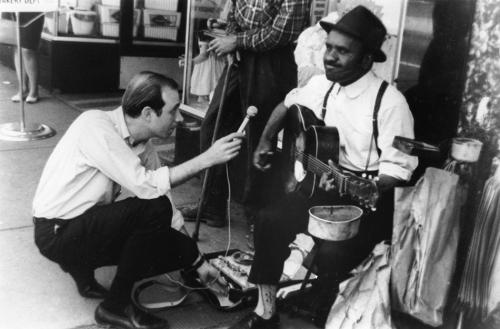 Ralph Rinzler records street musician Cortelia Clark in Nashville, Tennessee, on a fieldwork trip. Photo by Robert Yellin.