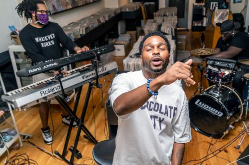 Live band performance in a record store.