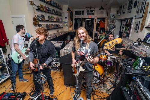 Live band performance in a record store.