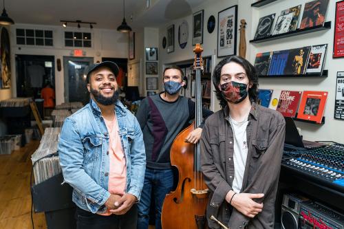 Live band performance in a record store.
