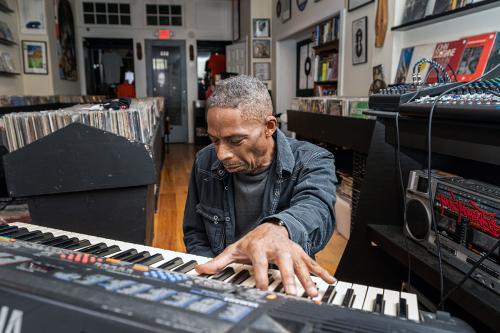 Live band performance in a record store.