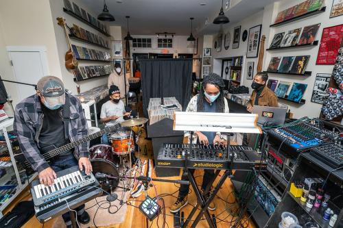 Live band performance in a record store.