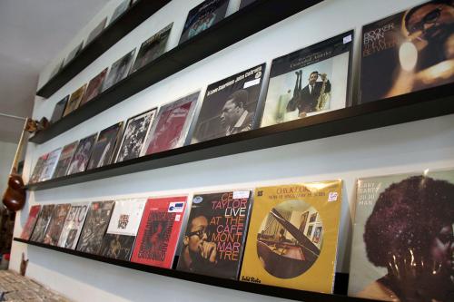 Rows of 12-inch records lined up on the wall of the store.