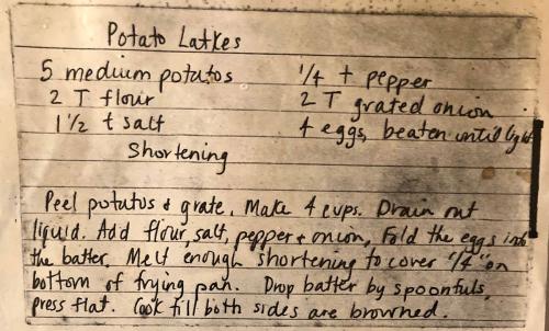 Recipe for Potato Latkes handwritten on an index card. A transcript of the recipe is in the text below.