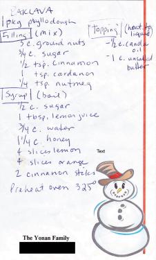 Baklava recipe handwritten on notepaper with an illustrated snowperson and The Yonan Family printed in black. Recipe text follows.