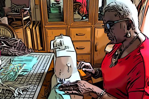 A woman works on a sewing machine. The photo has an effect on it to look like a digital illustration with thick black outlines.