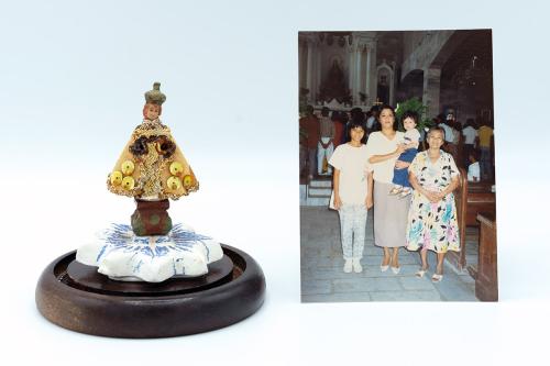 On the left, figurine of a saint with gold and beaded embellishment. On the right, photo of a family at church.