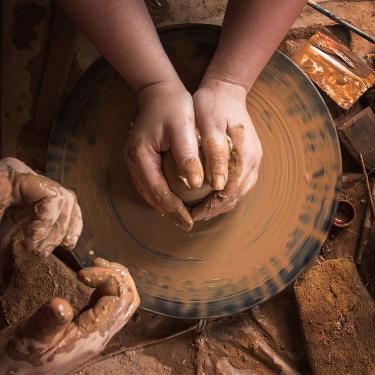 A student weaves at the Choki Traditional Art  School, established in 1999 on the outskirts of Thimphu, Bhutan, for  underprivileged children to learn painting, wood carving, weaving, and embroidery. Photo by Jake Naughton, Smithsonian