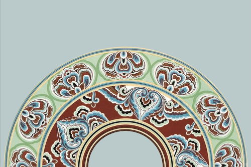 A semi-circle graphic filigree in blue, green and red. 