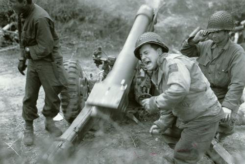 American howitzers shell German forces