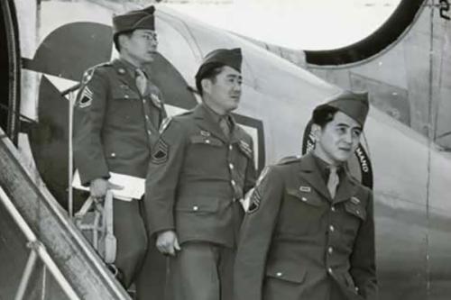 Japanese-American troops return from Burma