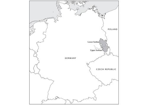 A black-and-white map of France with Italy to the east and Spain to the south. At the Spanish border if a dark gray region marked Occitanie, containing the city Toulouse, surrounded by a lighter gray region that spreads from the west coast into Italy. The