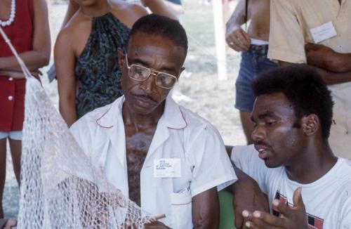 Rufus Pinckney (left), a fishnet maker from coastal South Carolina, demonstrated his craft technique at the 1974 Festival.