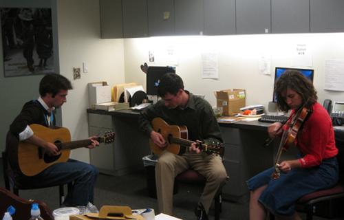 Douglas Peach, Folkways marketing director David Horgan, and Emily Hilliard&mdash;then a Folkways intern and now state folklorist of West Virginia&mdash;jamming in the Folkways offices.