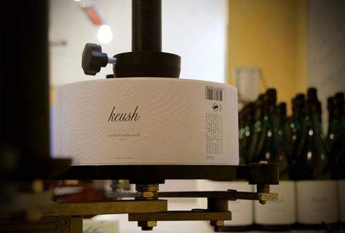 Labels for the Keush sparkling wine are printed at the winery.