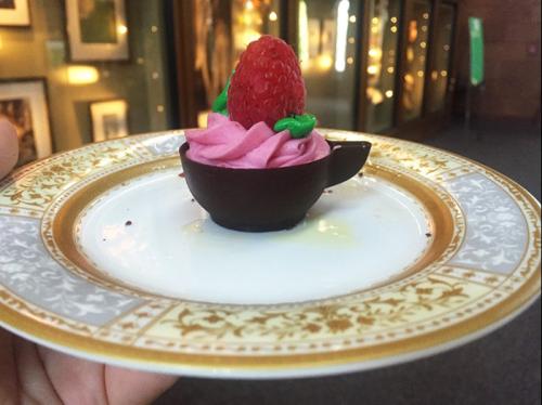 This raspberry mousse cup was one of many chocolate treats at the &ldquo;Healing High Tea.&rdquo;