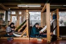 Weavers in Bhutan. Photo by Jake Naughton, Smithsonian