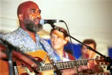 Josh White Jr. performs at the 2001 Smithsonian Folklife Festival.